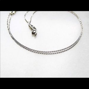 14k white gold diamond pendant.